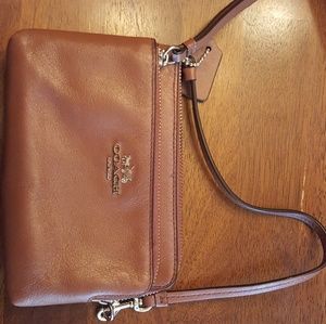 Brown coach wristlet